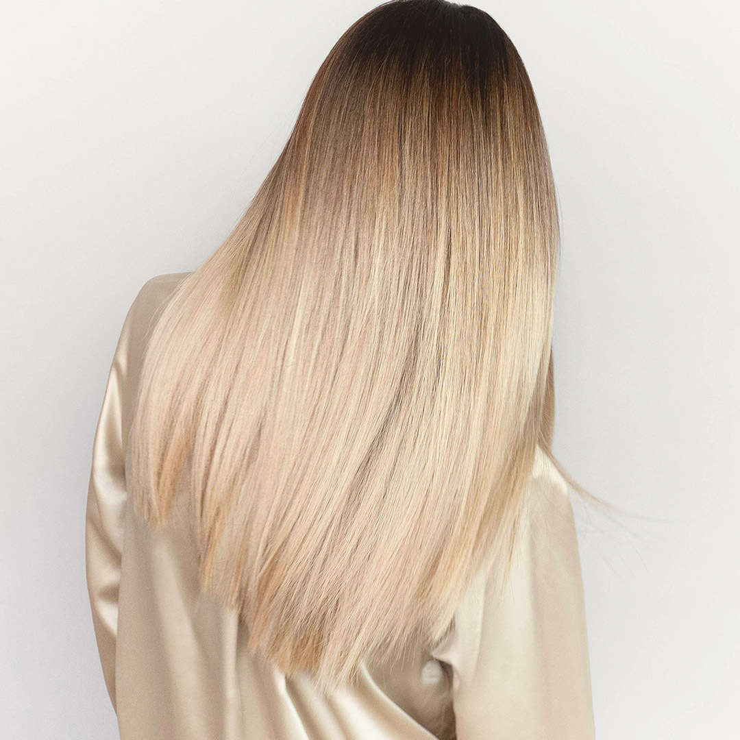 G2 – Mario Gutmann - Model Marietta - Vielschichtiges Blond (&copy; Great Lengths)